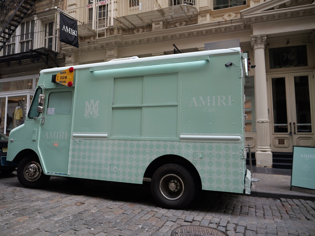 Vintage step-van ice cream truck activation on a city street